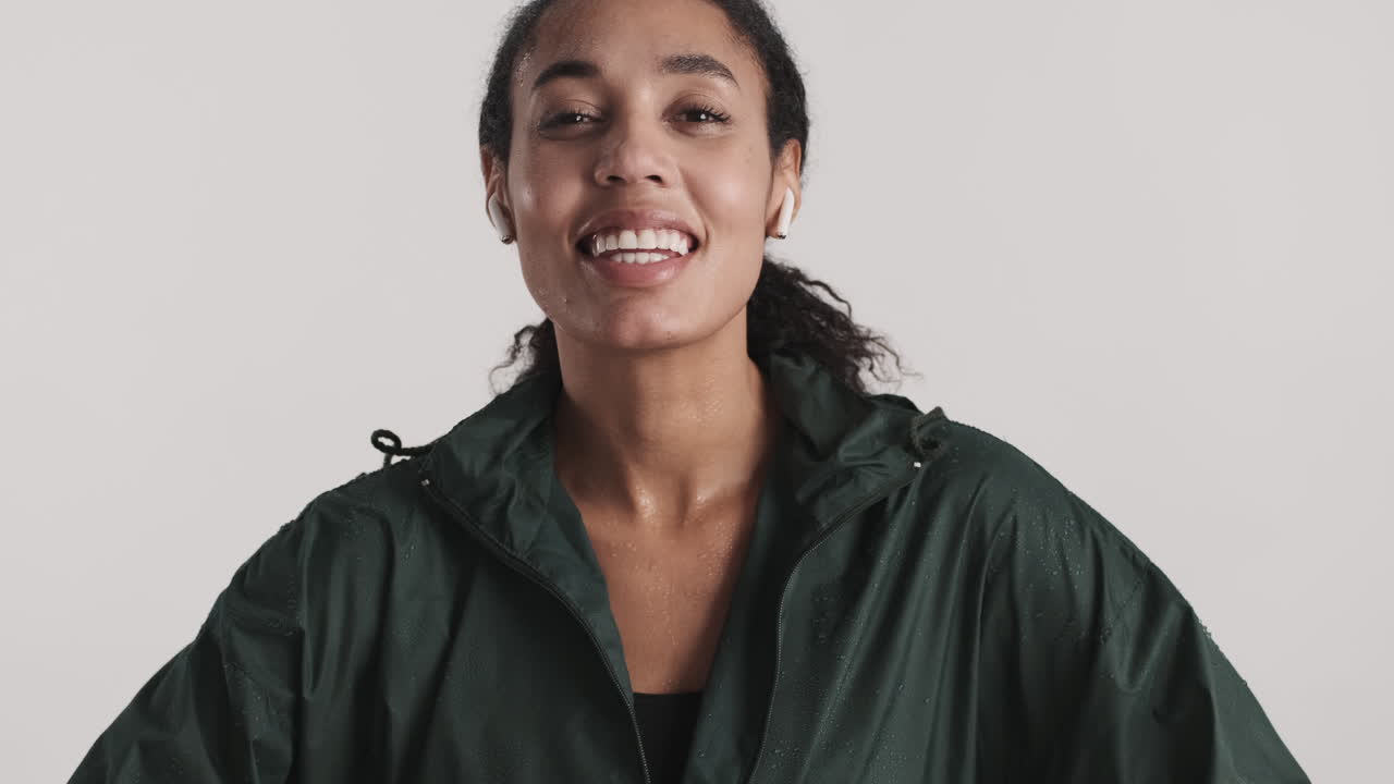 African american happy woman over white background.