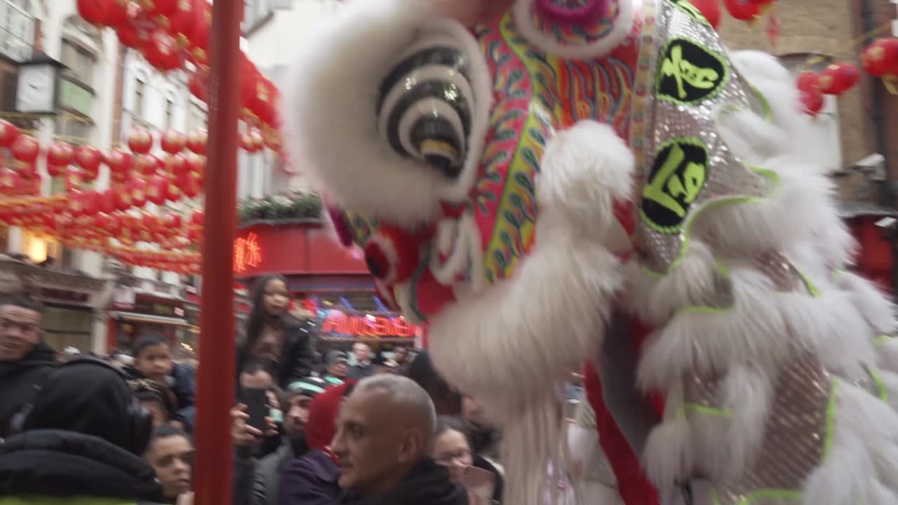 Dragon dancer in china town london england during new year celebration parade