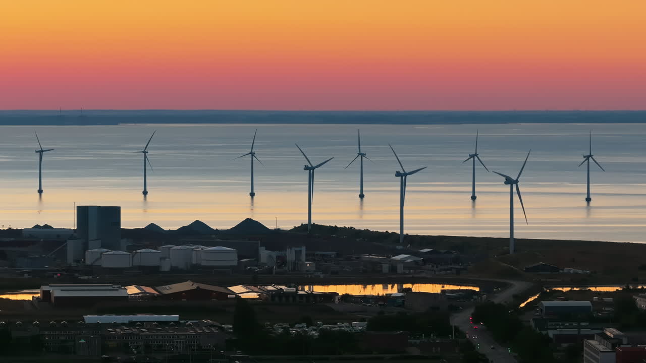 Aerial drone view of the Middelgrunden wind farm outside Copenhagen, Denmark at sunset