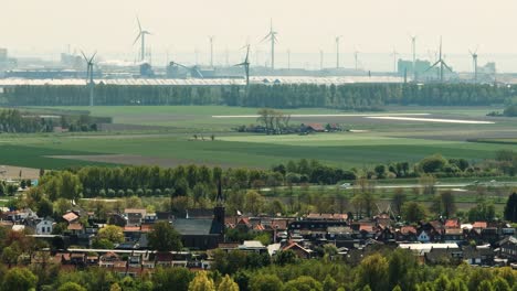windmill farm in arnemuiden netherlands wide drone shot