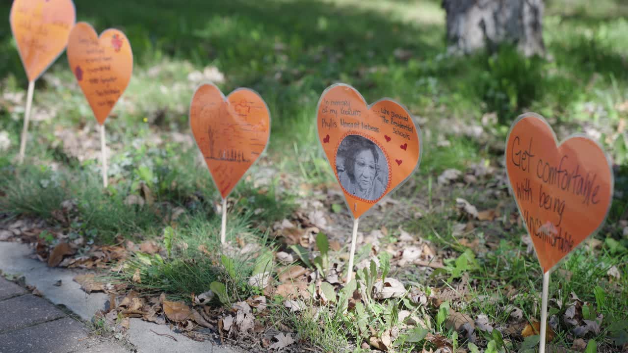 Line of Orange Hearts in Grass for National Day for Truth and Reconciliation
