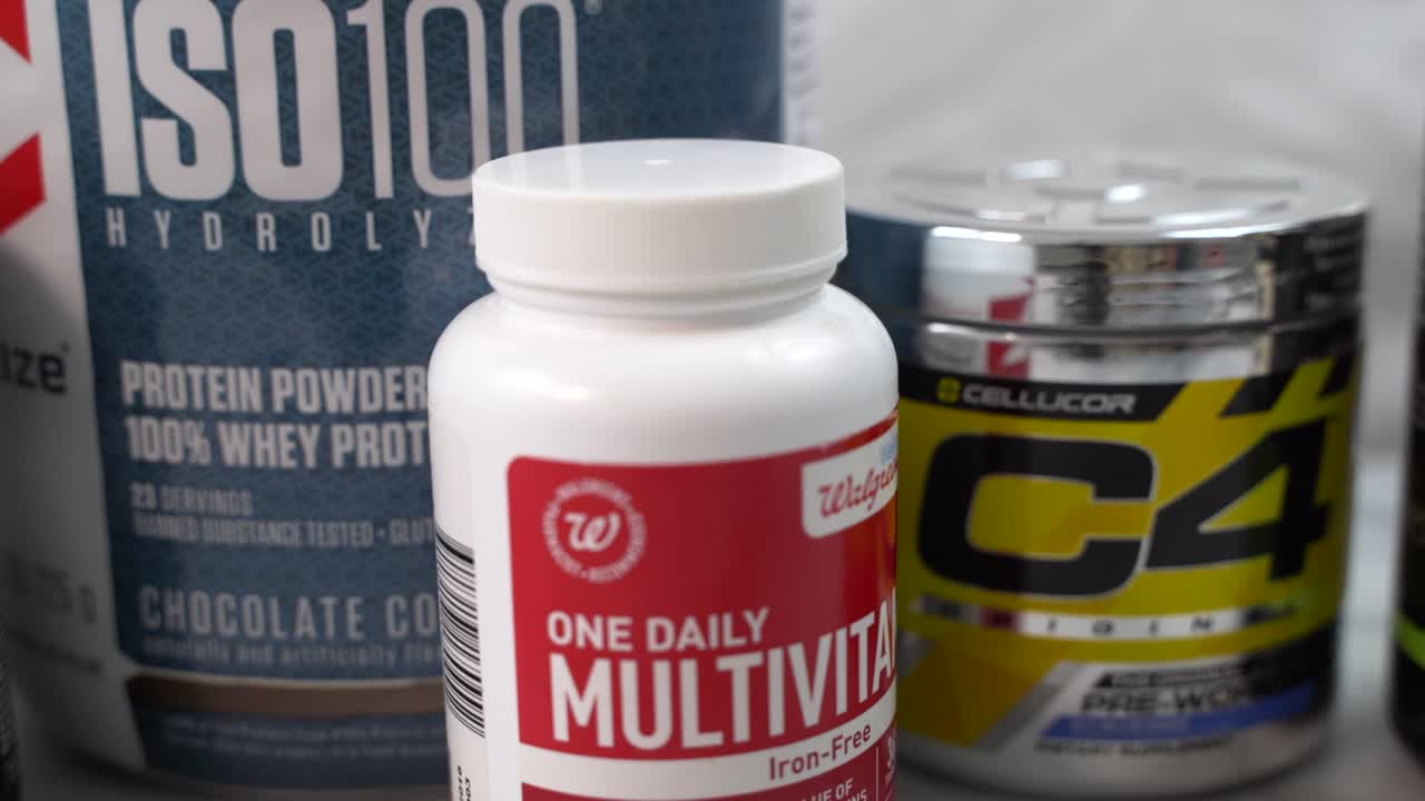 Various popular health and sports nutrition supplements for fitness goals. Slider shot.