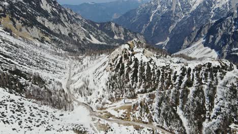4K footage showcases the stunning landscape and winding road of Vršič Pass