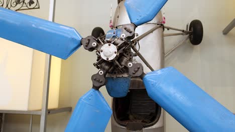 rotating blue propeller of a gyroplane exhibit