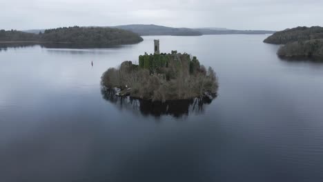 mcdermott castle on an island in lough key, roscommon, ireland, surrounded by calm waters