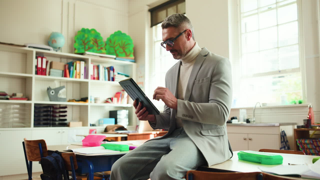 Teacher using tablet in classroom