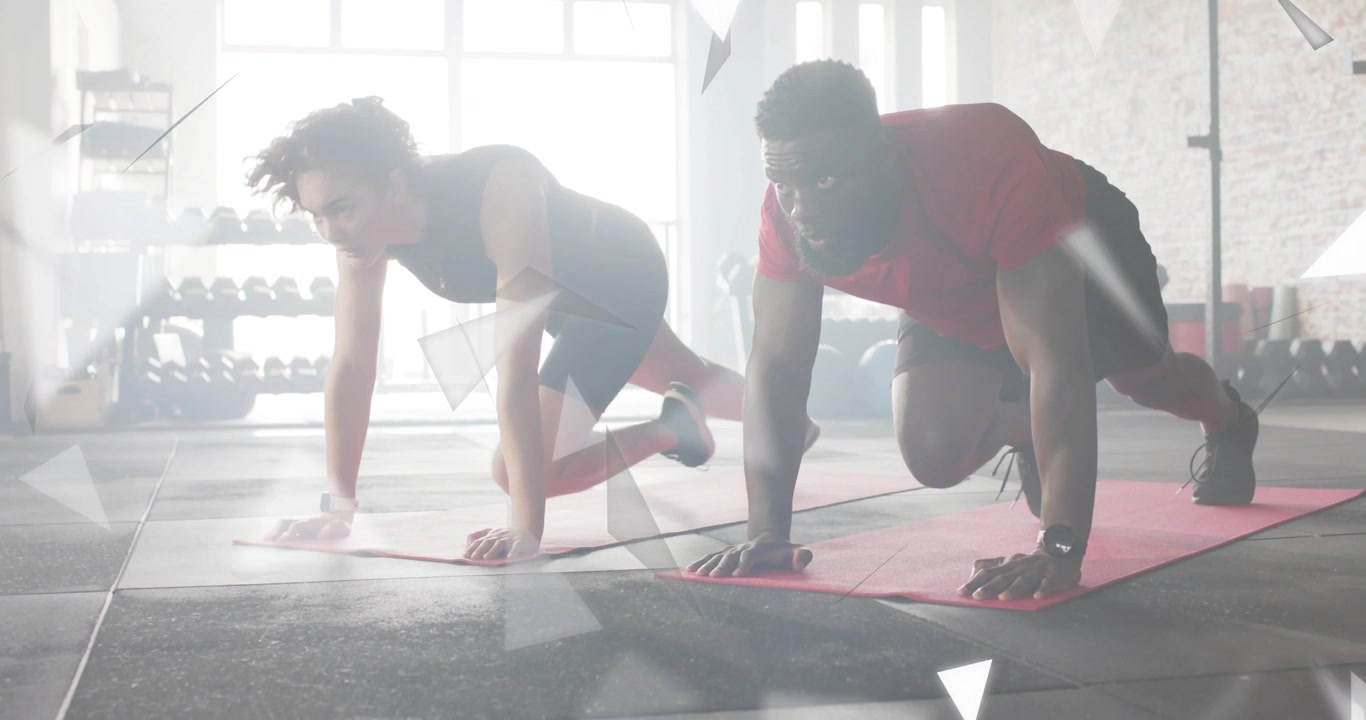 Settling into plank, partners cycling mountain-climber reps with triangles showing fitness strength