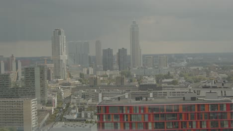 city skyline with highrises and bridge