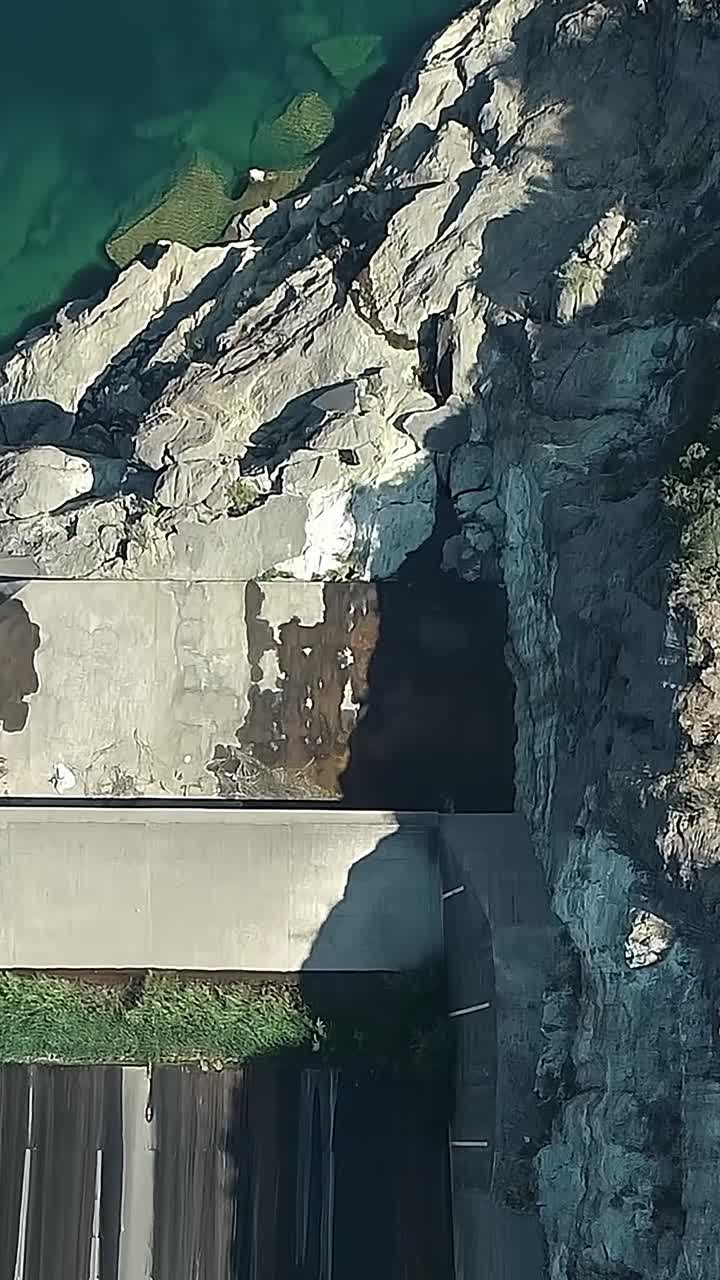 Dam structure and landscape near Colbun Lake in Chile during daytime