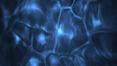 water caustic background dark and blue underwater