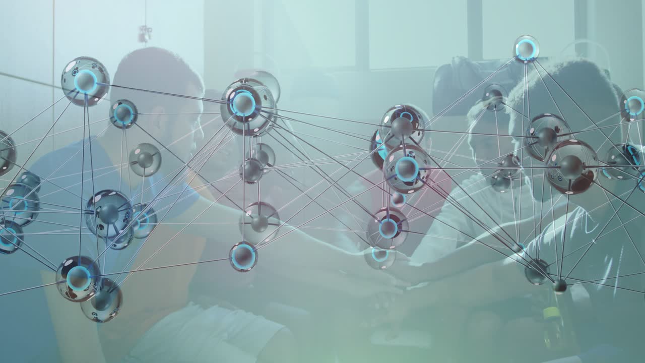 Men leaning forward initiating hand-stack in tech huddle, 3D node overlay shifting aside