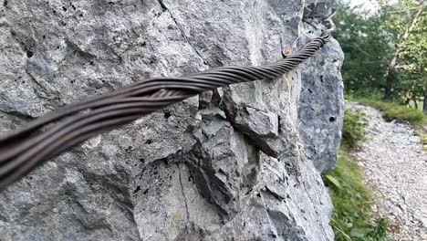 Steel rope fixed in block by screws snap hooks