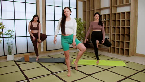 Women-doing-yoga-indoors