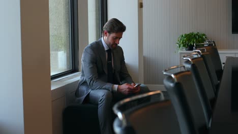 businessman using mobile phone in office 4k