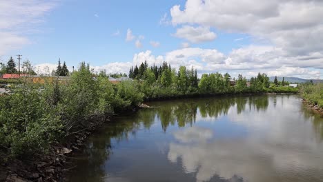 reflections in the chena river near the pioneer park in downtown fairbanks alaska