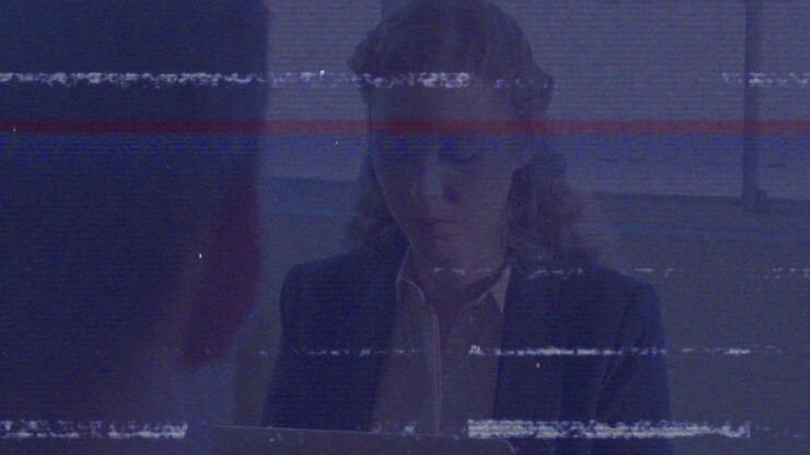 Animation of data processing on digital screen over diverse coworkers in office