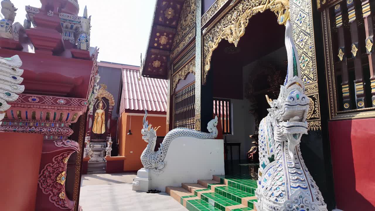 Wat Inthakin buddhist temple Chiang Mai Thailand exterior religious worship place