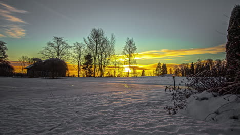 time lapse of snowy land behind a house