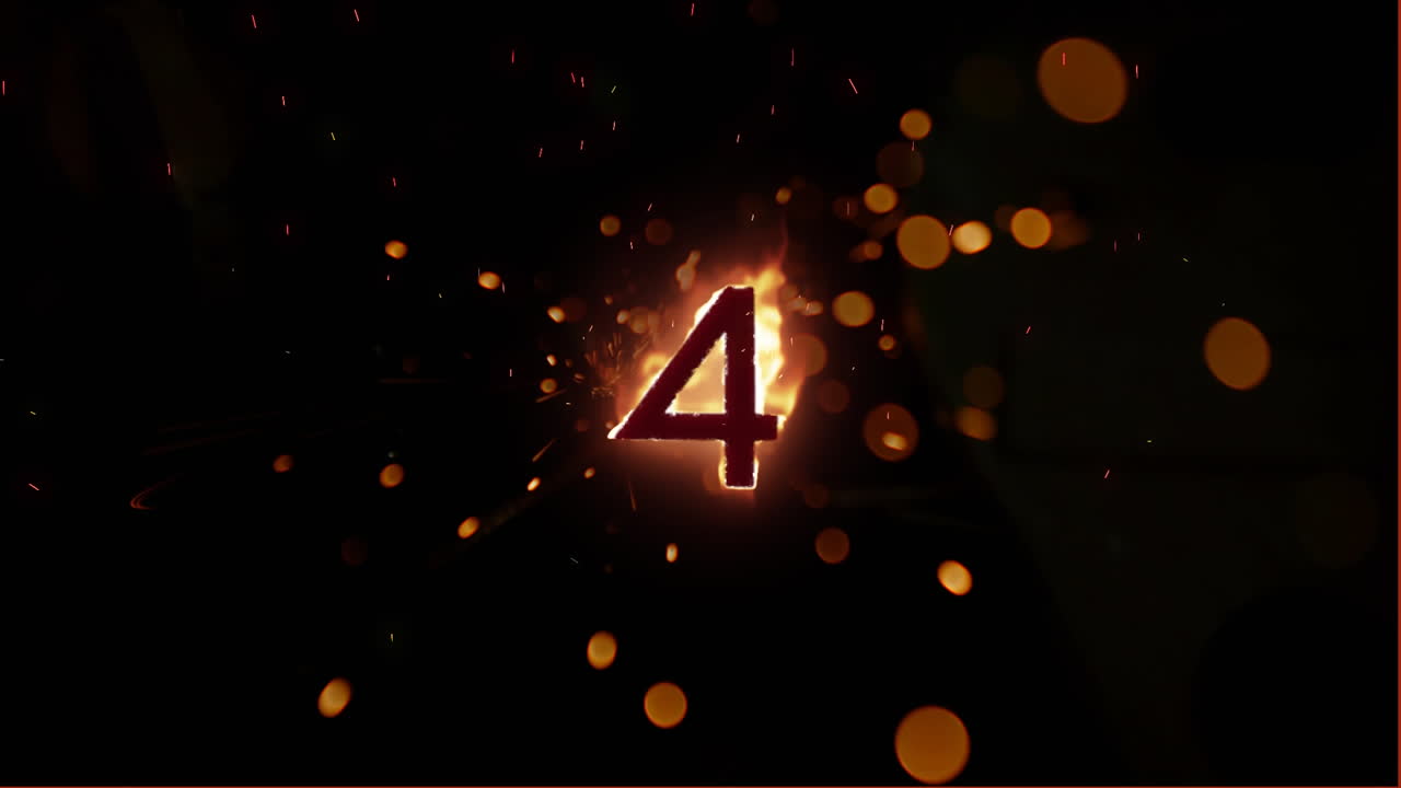 4 in flames on black background