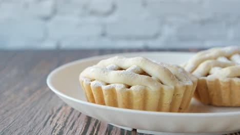 mini apple pies on a plate