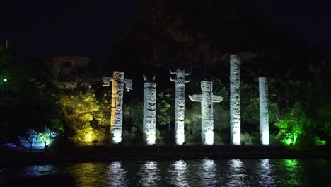 totem monument near the river at night guilin china