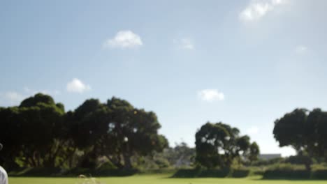 Bowler-delivering-ball-during-cricket-match