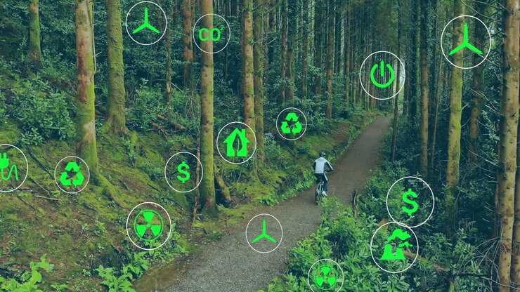 Male cyclist pedaling along mossy forest trail, featuring floating eco technology icons
