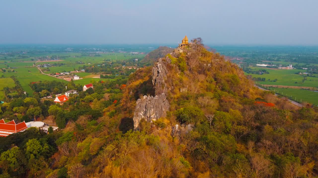 Hiking to a statue on top of a mountain with view surrounded by rice fields