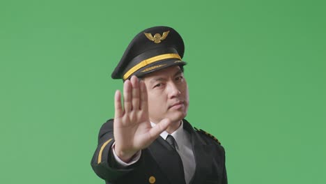 pilot making a stop gesture