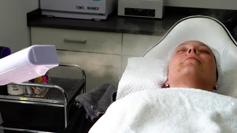 rejuvenating facial treatment: relaxation and skincare in a spa setting