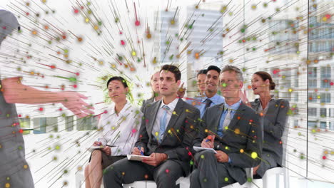 business professionals in meeting with colorful data visualization animation overlay