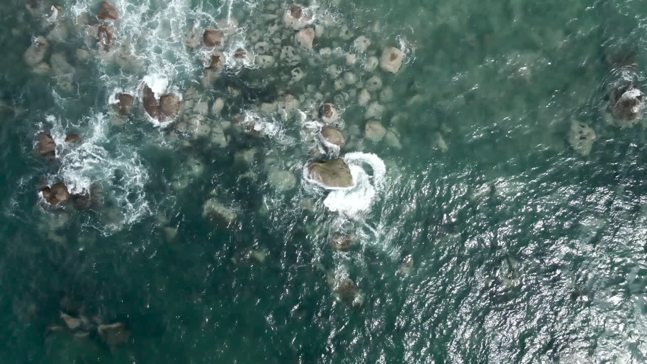 Overhead View Of Waves Crashing On The Rocks In San Pancho, Mexico. - aerial ascend