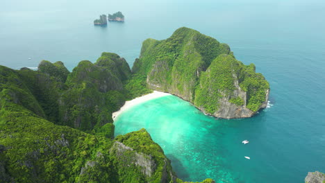 Famous-Maya-Bay-in-Thailand,-picturesque-beach-with-no-people,-aerial-forward
