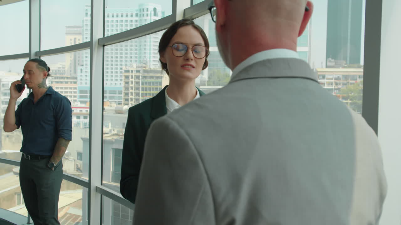 Businesspeople Meeting at Office to Discuss Work