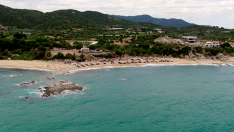 aerial shot of almyra luxury resort surrounded by amazing landscape and beautiful azure ocean