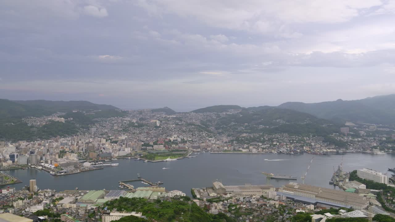 Perfect panorama over Nagasaki Bay on cloudy day at sunset
