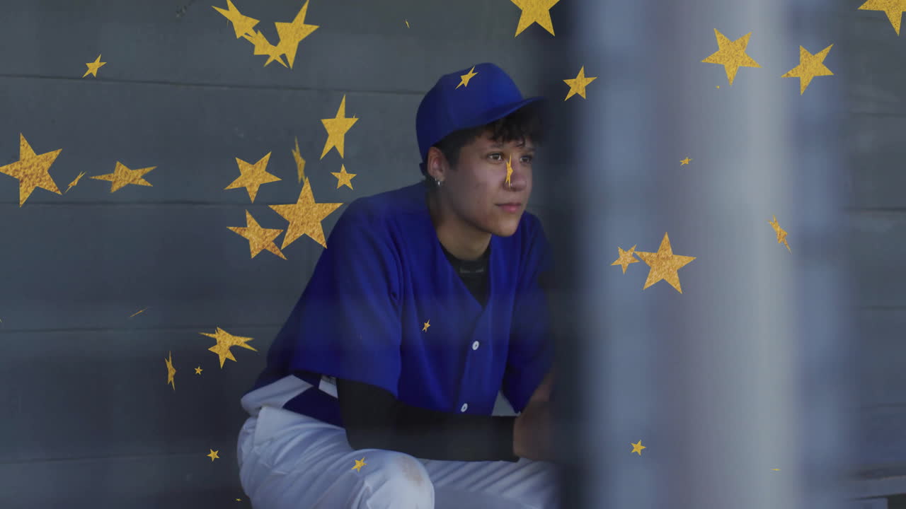 female baseball player sitting in dugout, with gold star graphics showing sports analytics