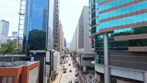 traffic and pedestrians in urban hong kong