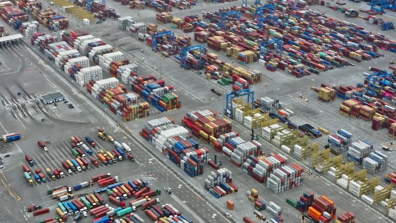 Cargo containers stacked in Accra port area during the day