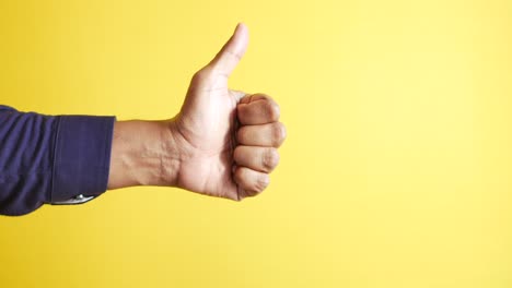 man hand showing a thumb-up