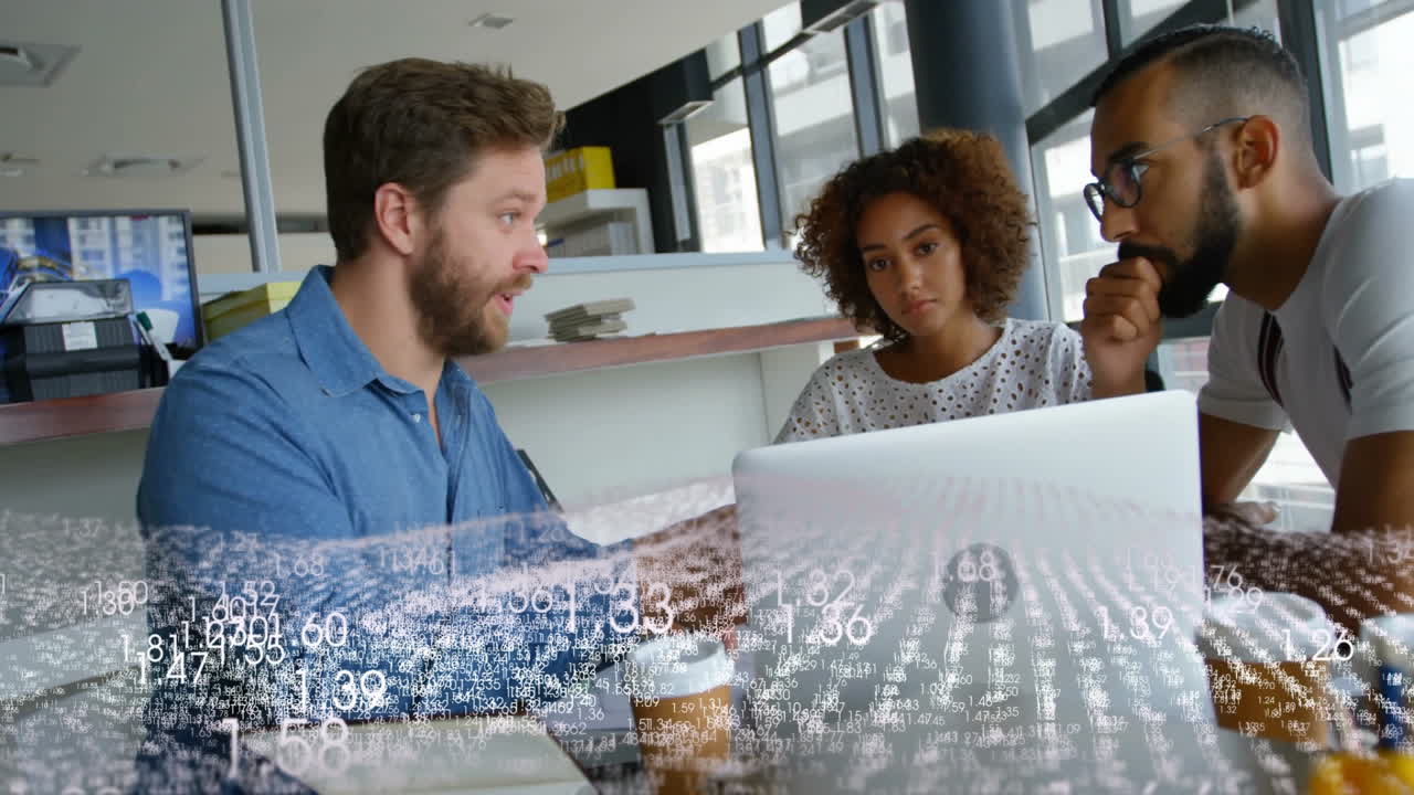 Diverse team discussing project at office with data processing animation overlay