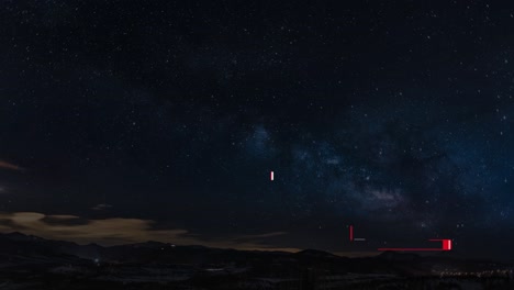 night sky over mountains with milky way