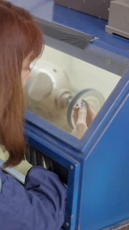 polishing metal parts in a workshop