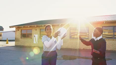 schoolchildren playing in the playground at a township school 4k