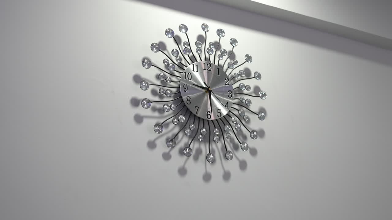 Decorative wall clock with elegant design and unique style enhances interior decor in modern space