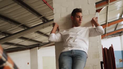 male dancer in an empty warehouse