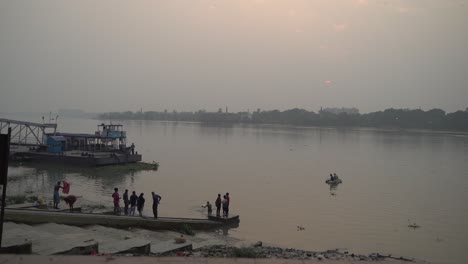 the banks of the river ganges at low tide