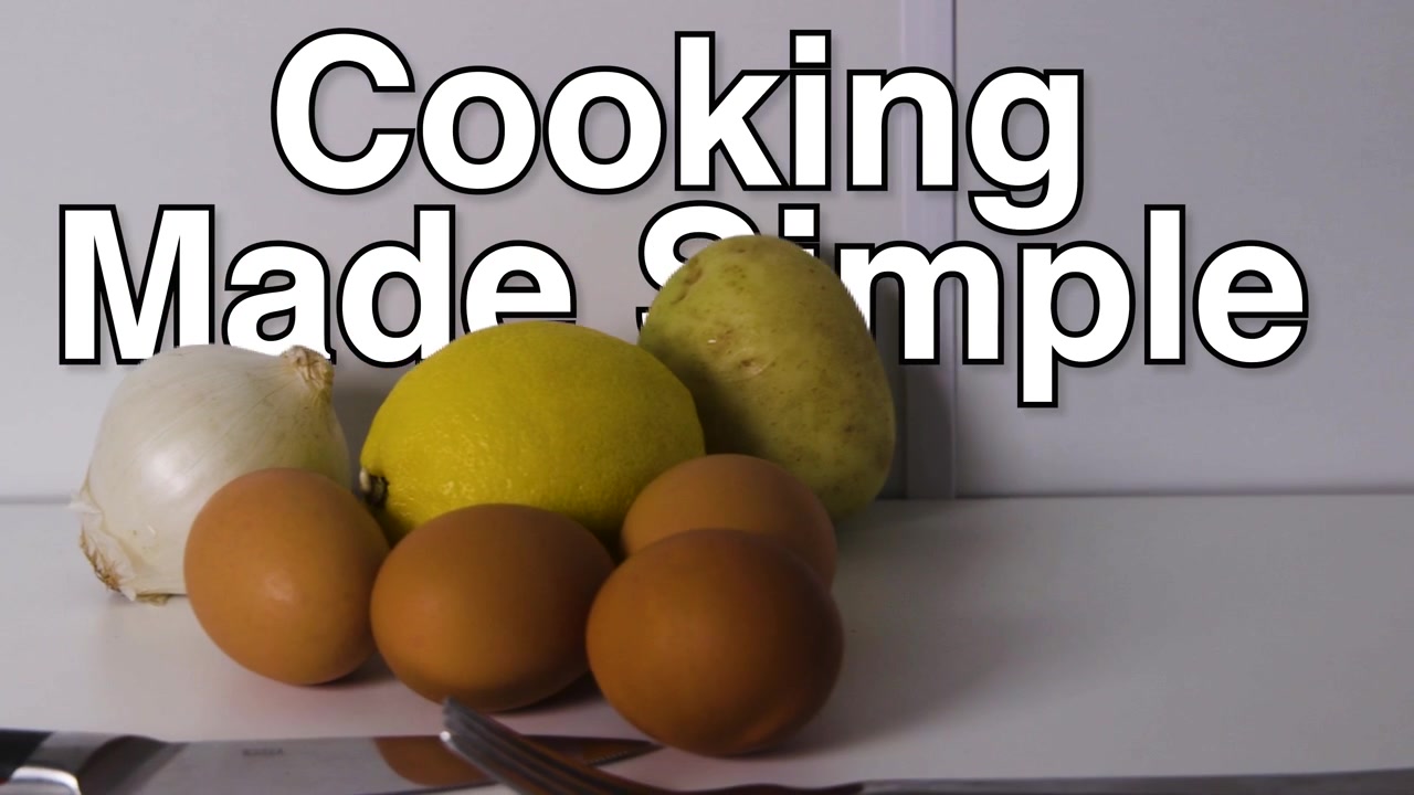 Cooking Made Simple phrase overlays a still life of raw eggs, lemon, potato, onion and cutlery arranged on a tabletop.