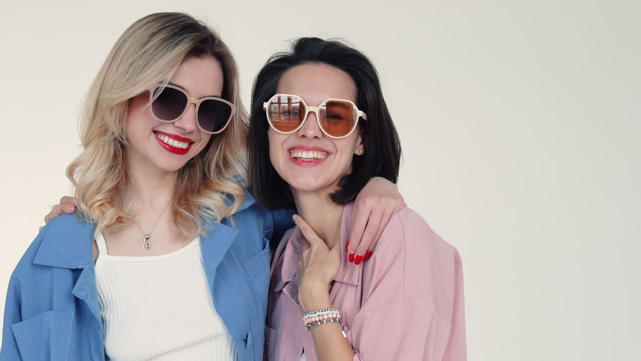 Two Women Friends Wearing Trendy Outfits
