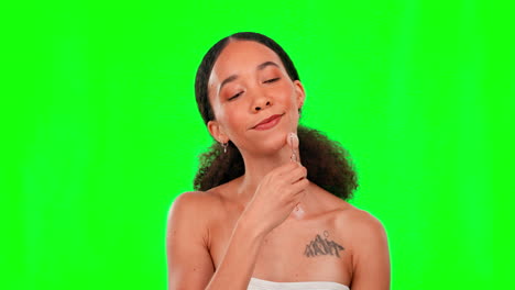 Face-roller,-beauty-and-woman-on-green-screen